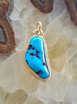 Pendentif patte d'ours