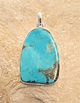 Pendentif patte d'ours