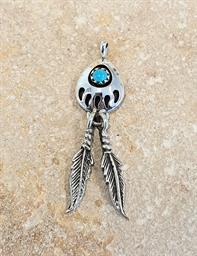 Pendentif patte d'ours et plumes