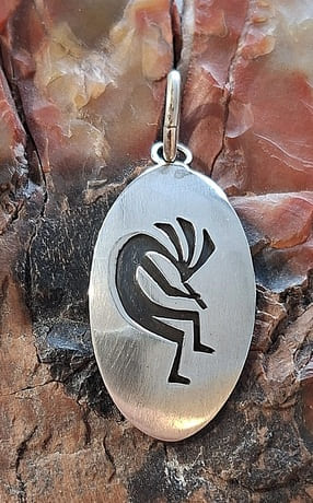 Pendentif Kokopelli en argent 925°.