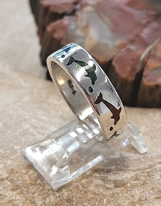 Bague dauphins en argent 925°.