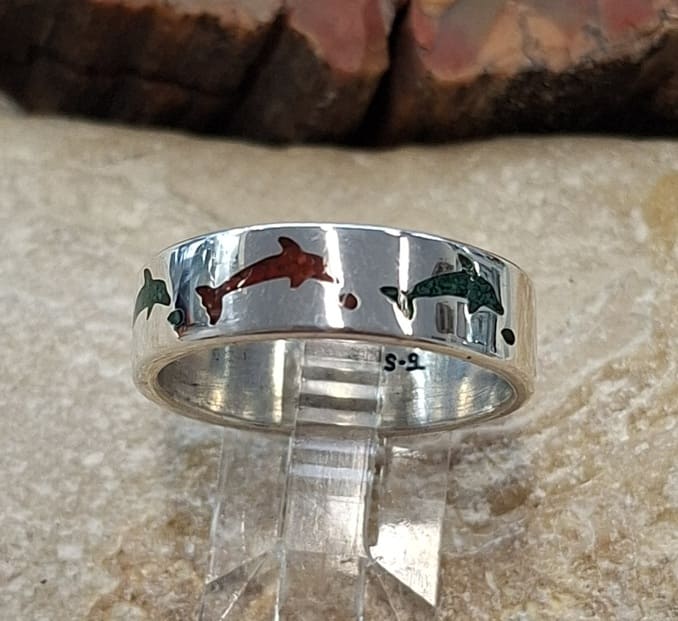 Bague dauphins en argent 925°.