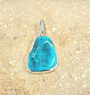 Pendentif Turquoise Sleeping beauty en argent.